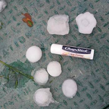 Size Comparison of hail to a tube of lip balm