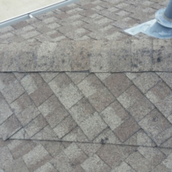Hail damage on composition shingles