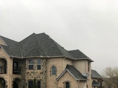 old large home with foggy background