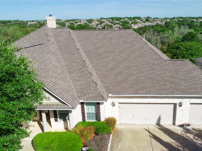 view from above the roof of a two garage large house